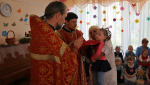 48 воспитанников Борисовского дома ребенка причастились Святых Христовых Таин